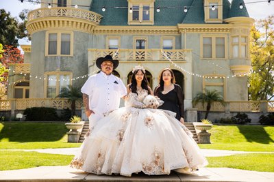Kimberly Crest Quinceanera portrait with parents