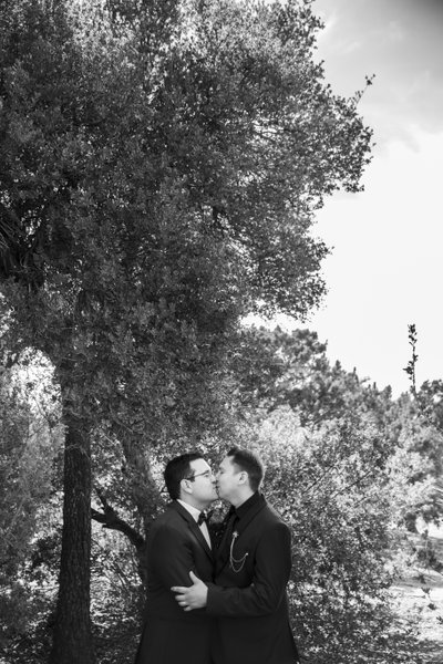 Two gentlemen Kiss,  by Louis G Weiner Photography