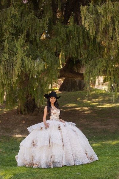 Kimberly Crest Quinceanera in Dad's cowboy hat