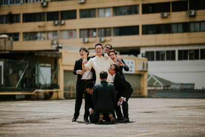 Groomsmen Having Fun During Actual Day Wedding Photography Singapore