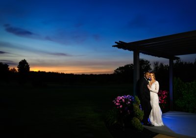 Romantic Sunset Photo with Bride and Groom
