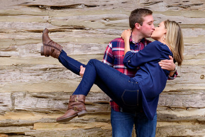 Zilker Botanical Garden Fun Kissing Engagement Pose