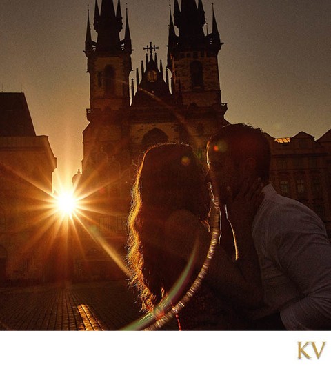 Sun flared sunrise engagement in the Old Town Square