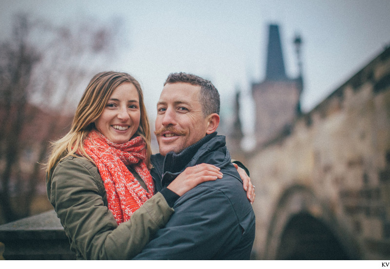 The happy newly engaged at the Charles Bridge in Kampa