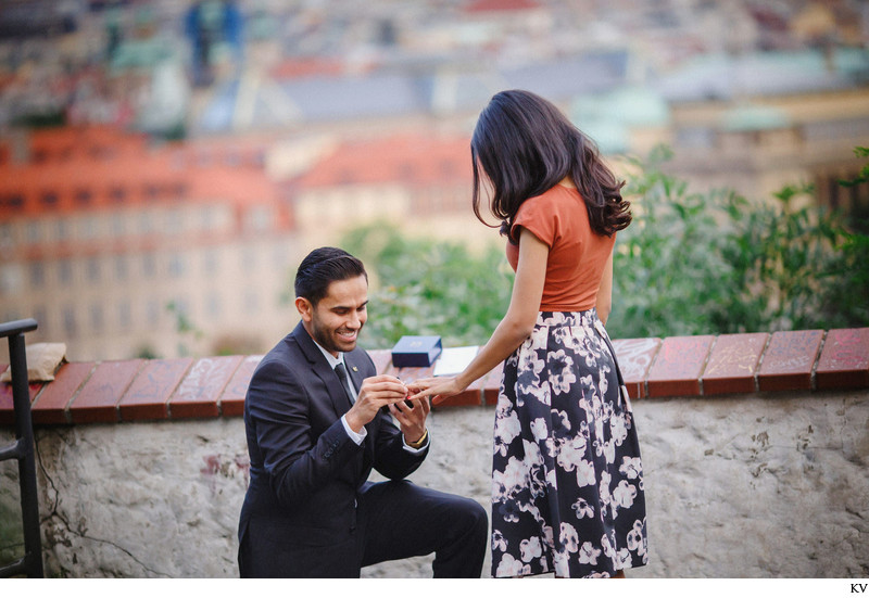 romantic Prague marriage proposal ring on finger