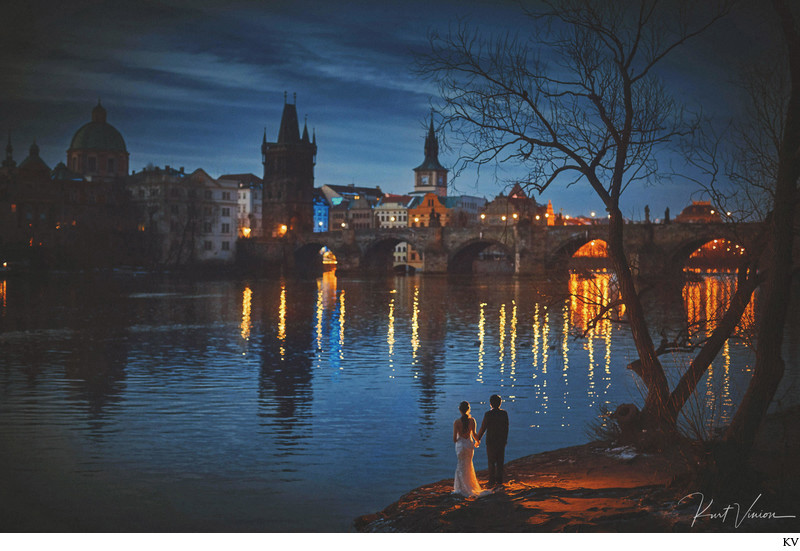 romantic artistic image couple Charles Bridge night