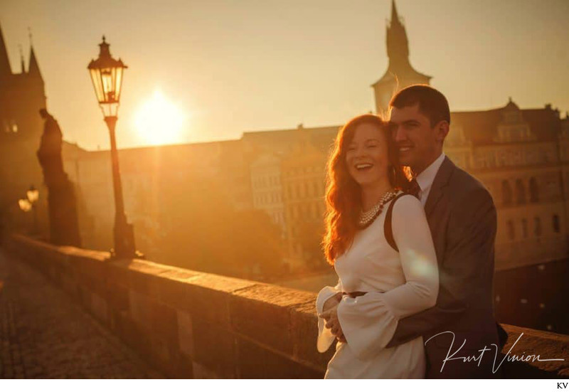 enjoying the warmth of the rising sun Charles Bridge