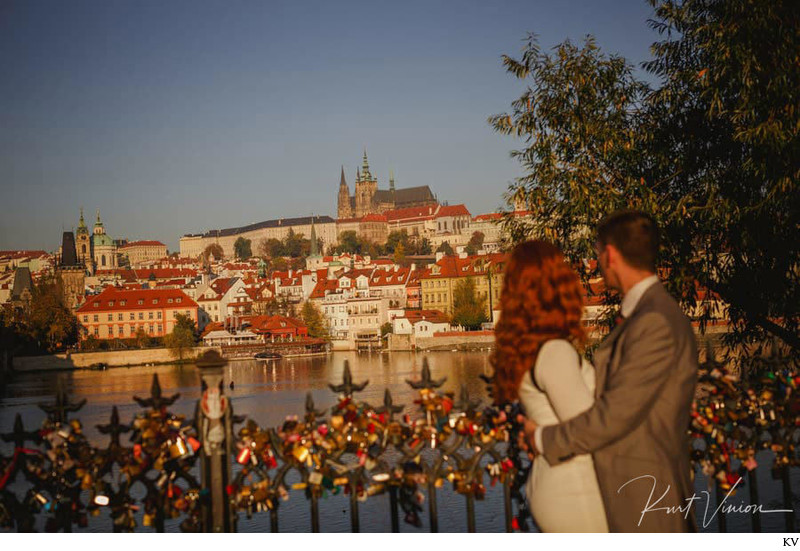 watching the sunlight illuminate Prague Castle