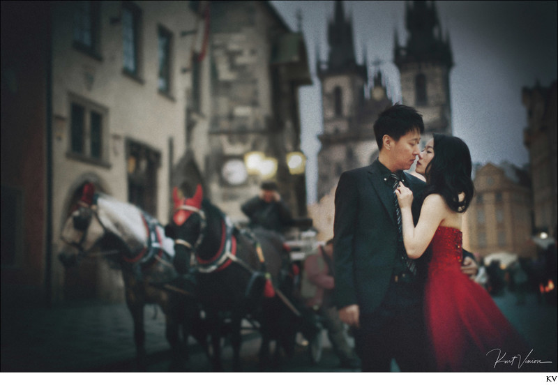 woman in red + horse & carriage Old Town Square Prague