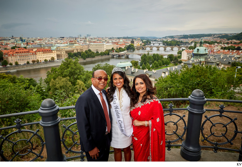 Family portrait overlooking the city of Prague below