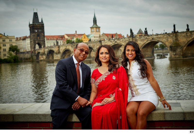 Happy family portrait near the Charles Bridge