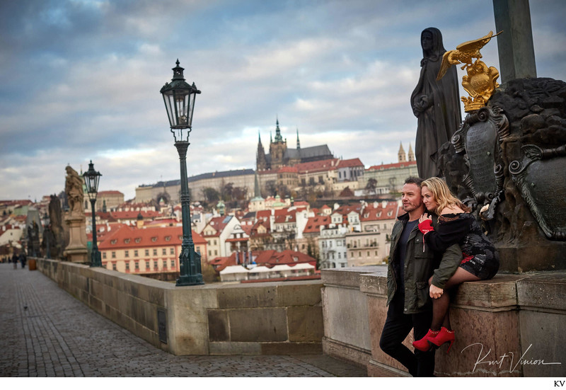 snuggling up at the Charles Bridge at sunrise