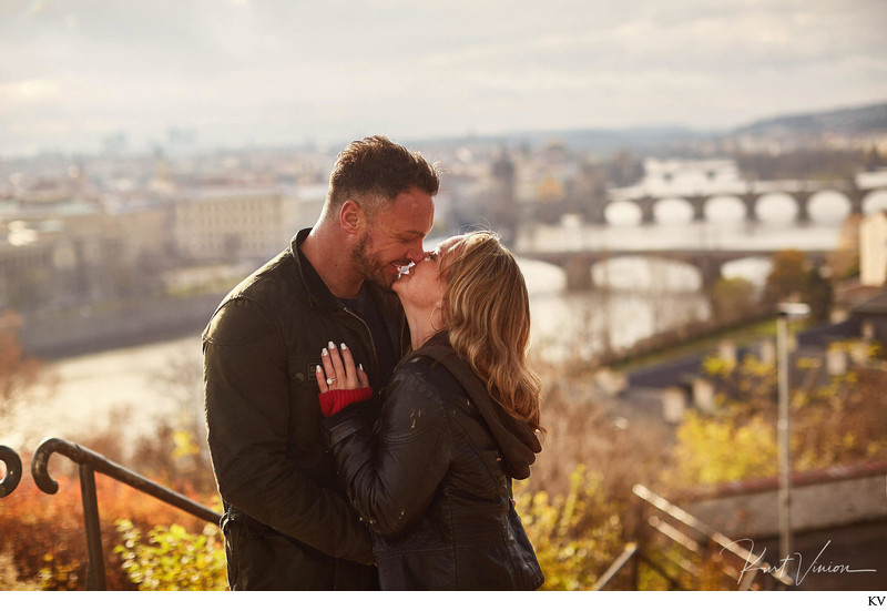 the happy newly engaged overlooking Prague