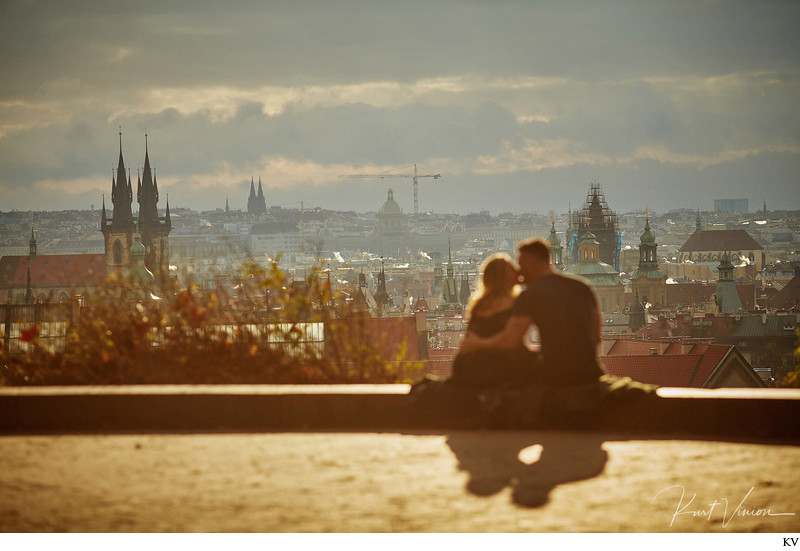 silhouetted against the Prague skyline C&M