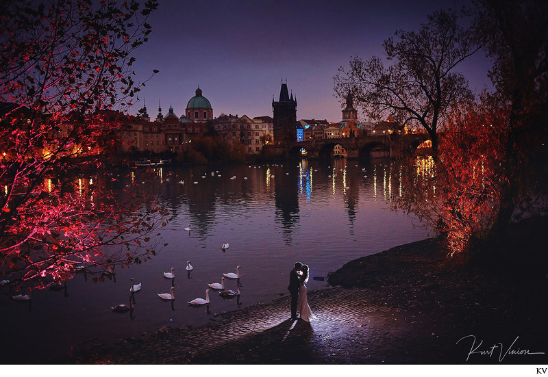 sexy couple at riverside night time portrait