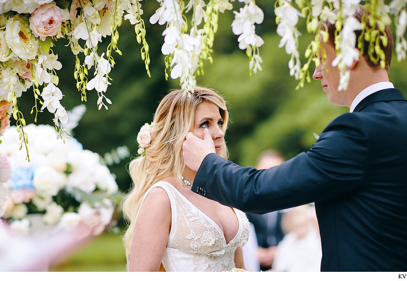 Hluboka nad Vltavou Castle wedding wiping brides tears