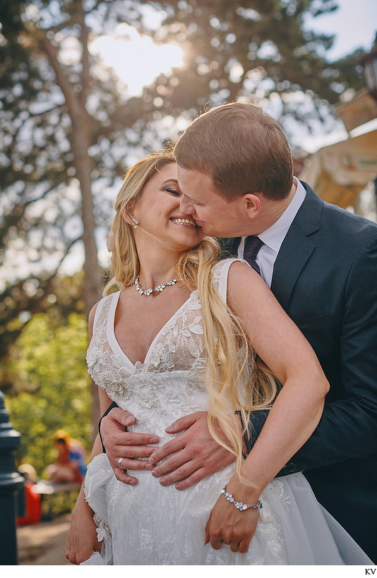 The radiant bride smiles at her groom