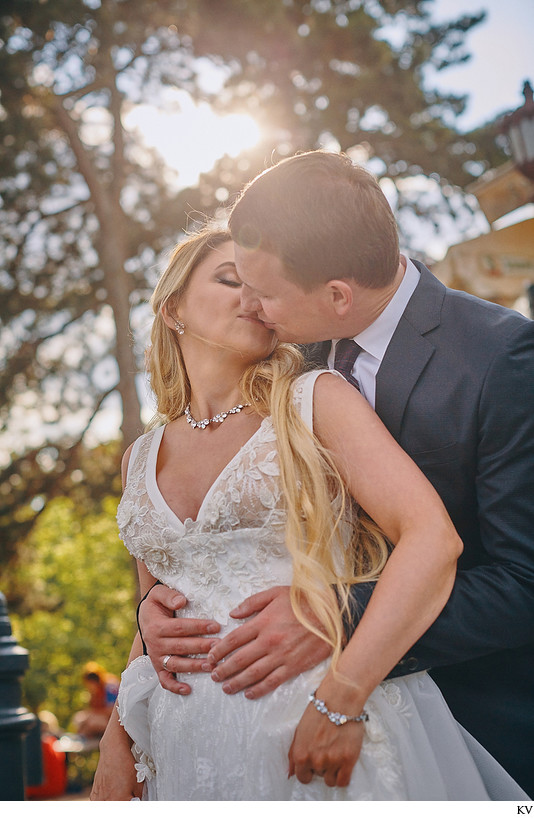 beaming bride kisses her groom