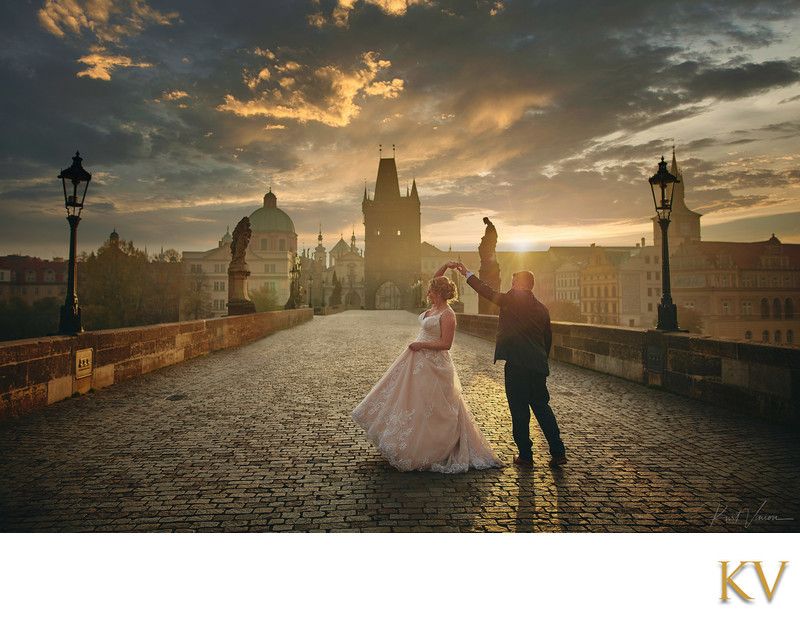 bride & groom dance at sunrise Charles Bridge