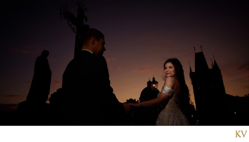 Turkish bride & groom experiencing sunrise Charles Bridge