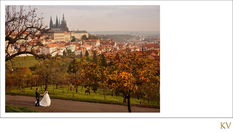 bride & groom exploring  vineyards above Prague Castle