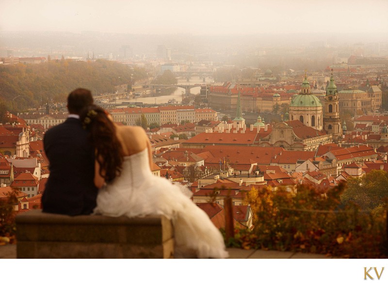 wedding couple enjoy romantic view above Prague