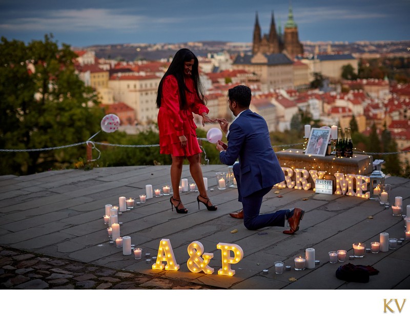 Epic Marriage Proposal Prague - placing the ring