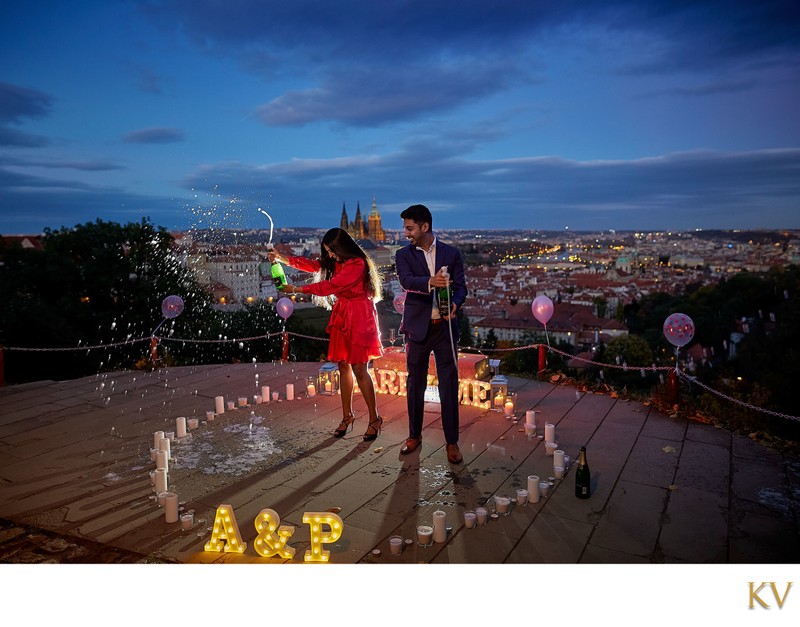 Celebrting with champagne high above Prague