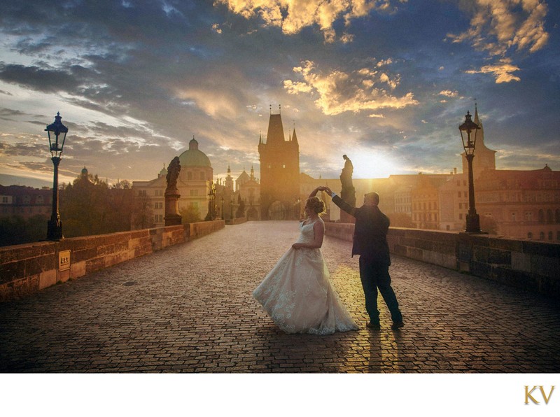 Dancing Newlyweds Atop Charles Bridge at Sunrise