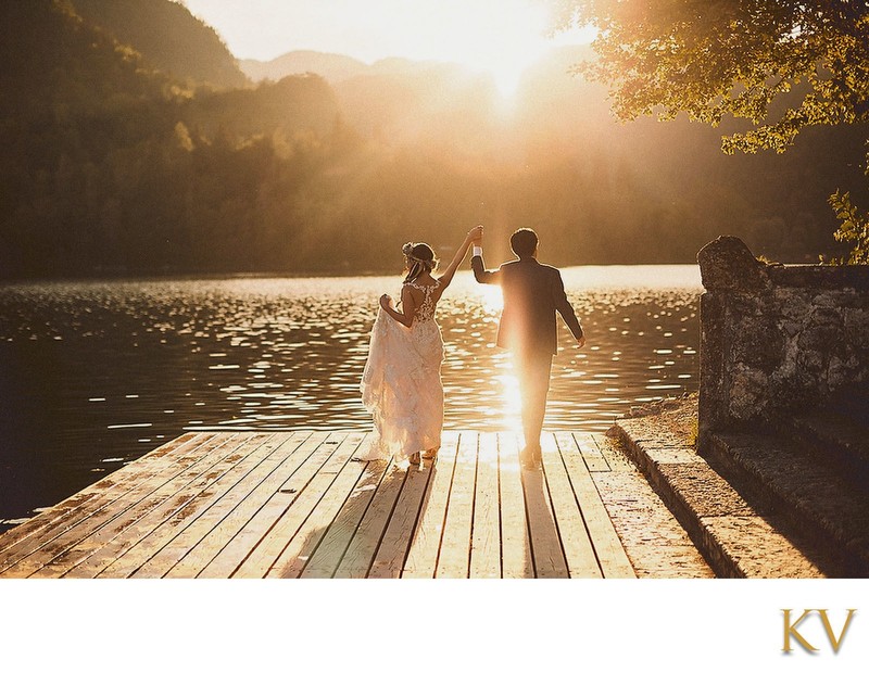 Newlyweds Celebrating in the Golden Light, Lake Bled