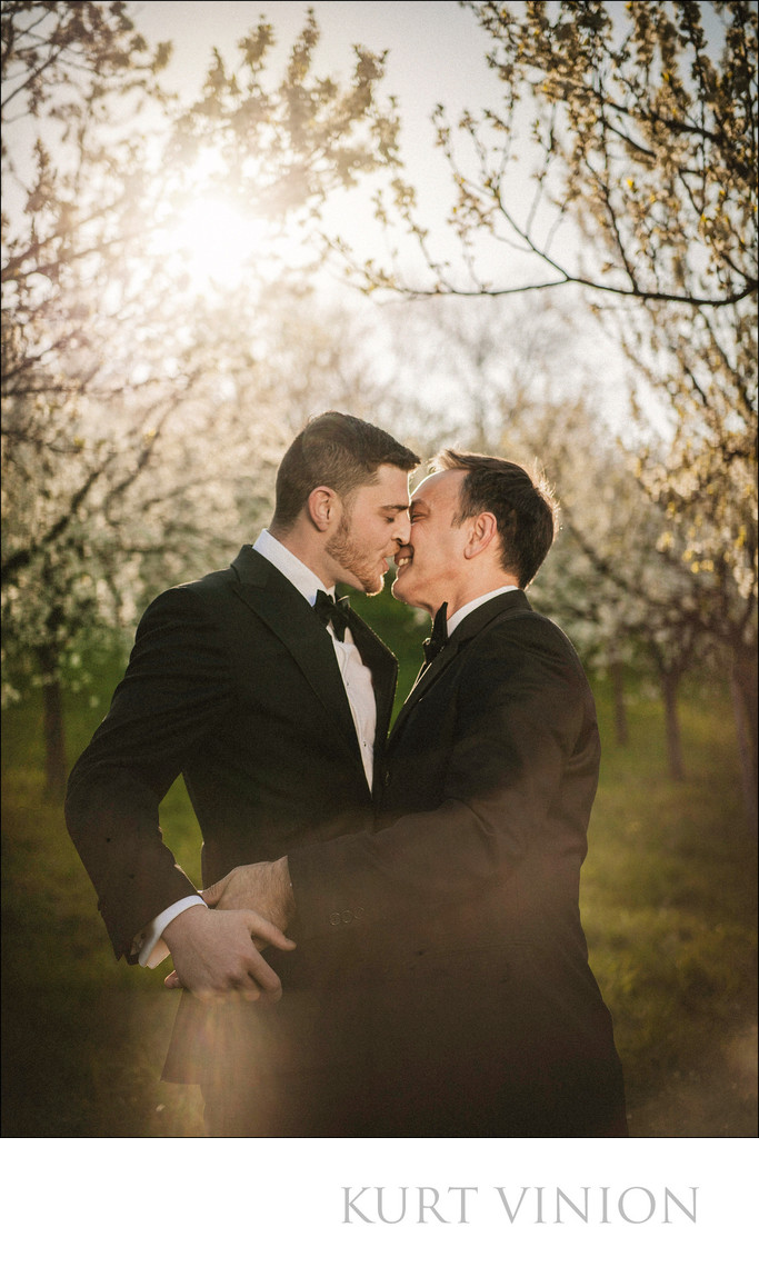 a sun flared kiss for these two gentlemen