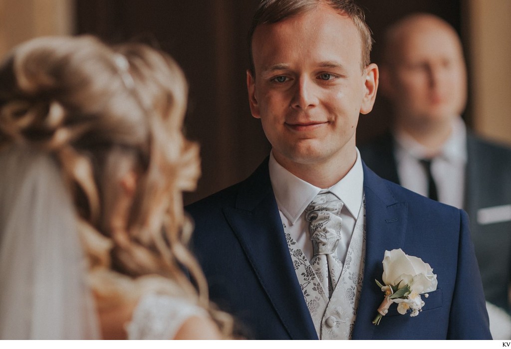 The happy groom during his wedding