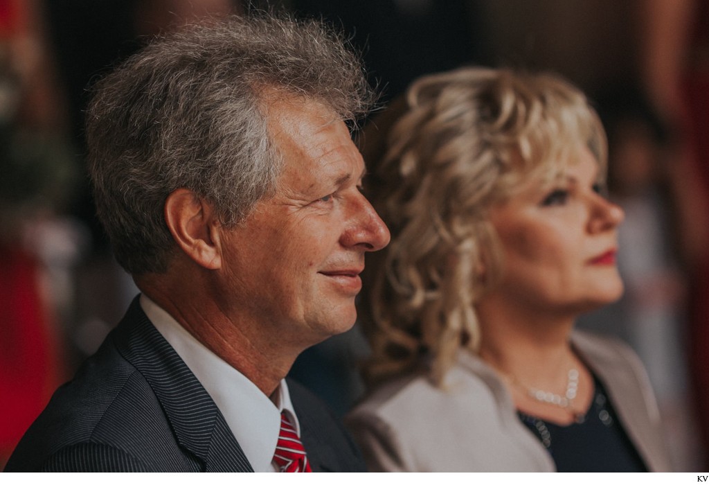 Father of the bride watches his daughter marry