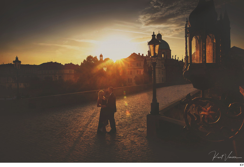 sunrise love atop the Charles Bridge