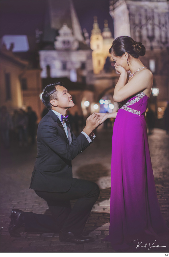 Ray proposes to Enzo atop the Charles Bridge in Prague