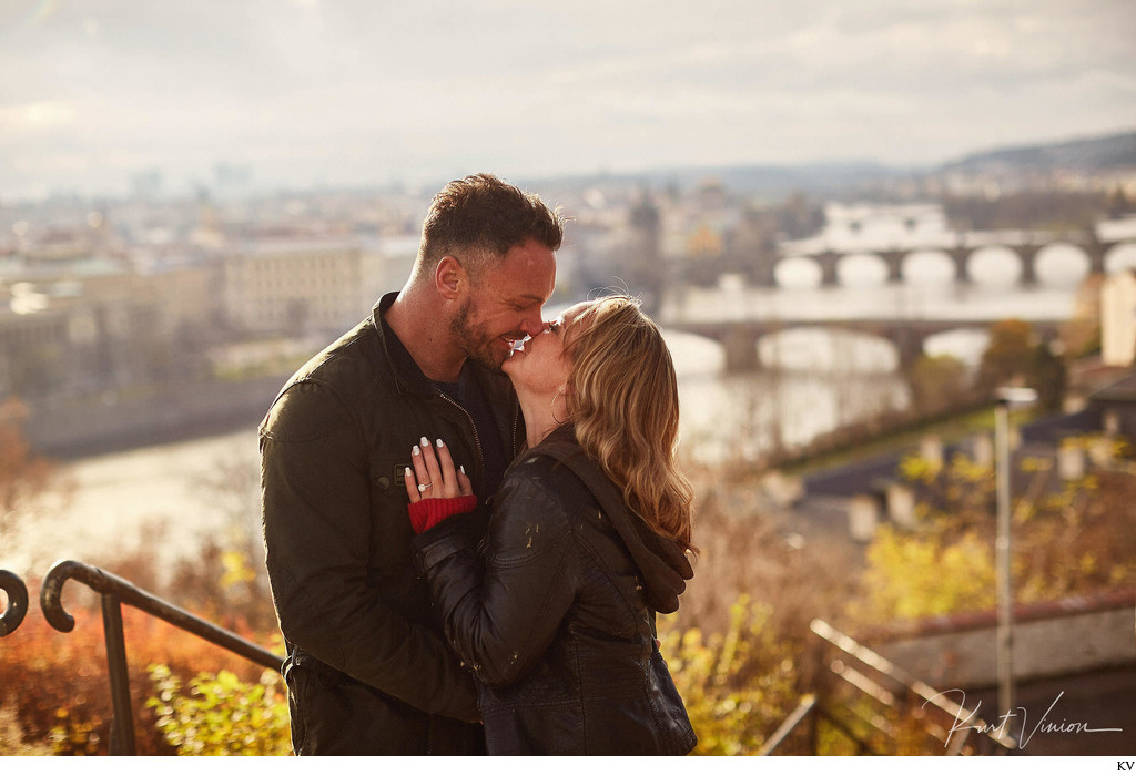 the happy newly engaged overlooking Prague