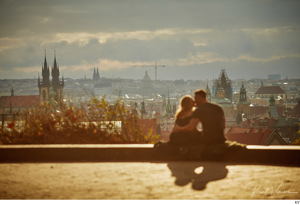 silhouetted against the Prague skyline C&M