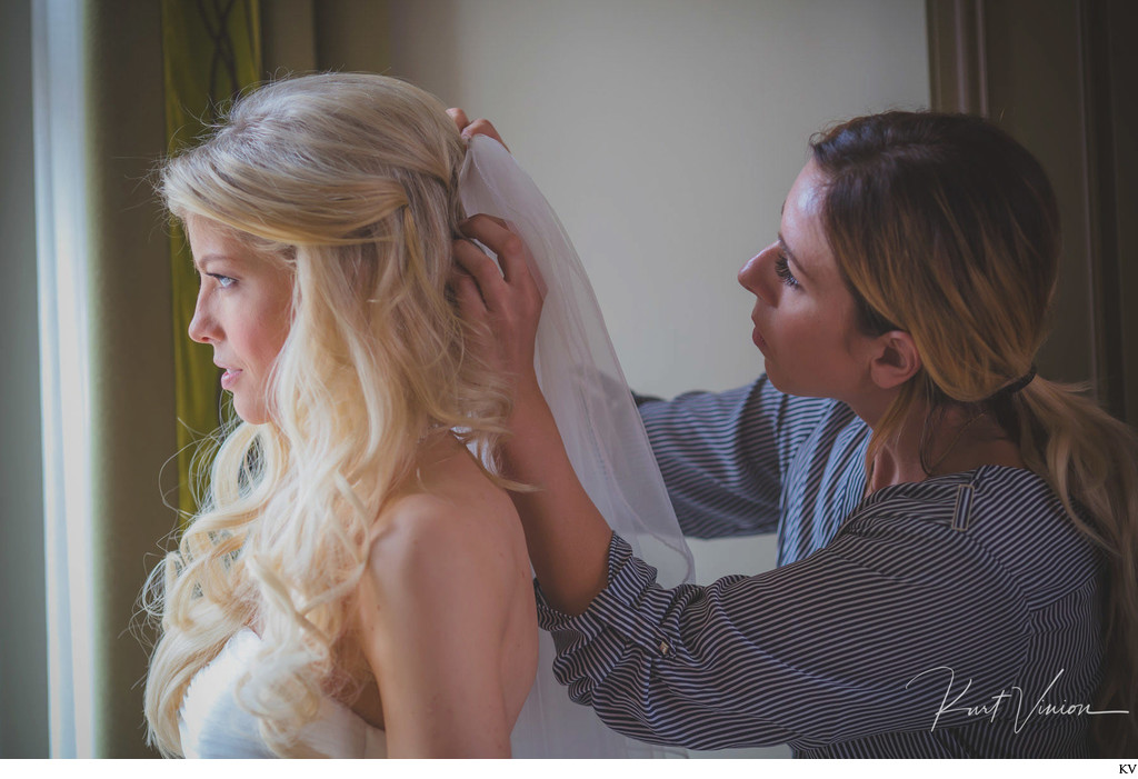 putting on the bride's veil at the Augustine