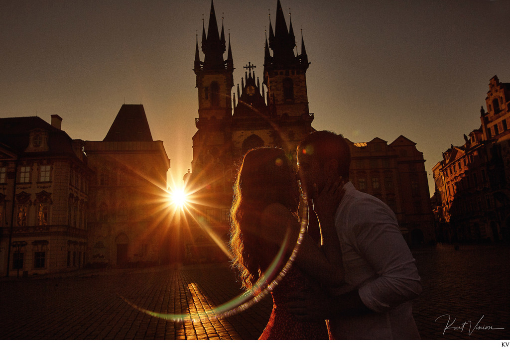 sun-flared lovers in the Old Town at Sunrise