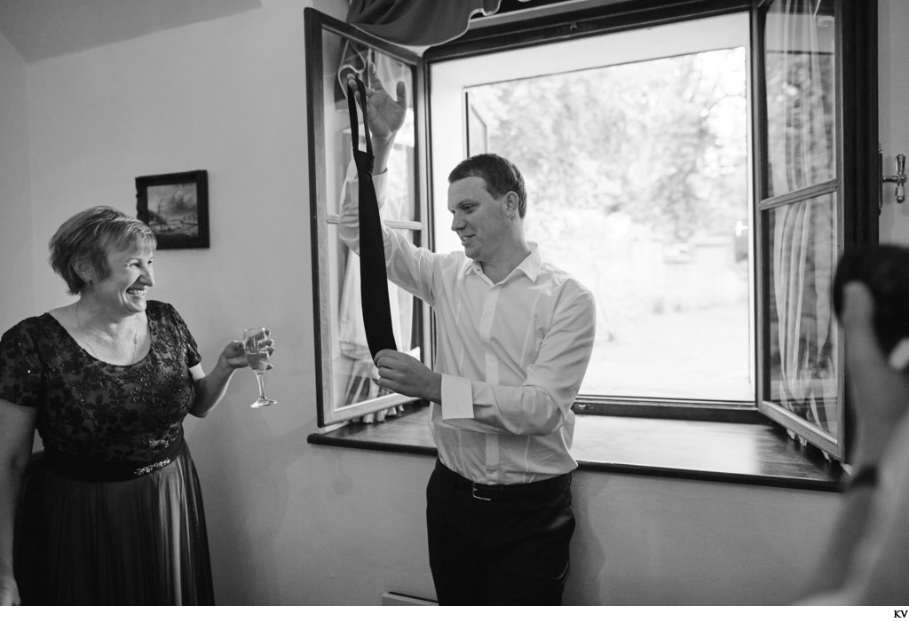 Mother of Groom as he picks out his tie