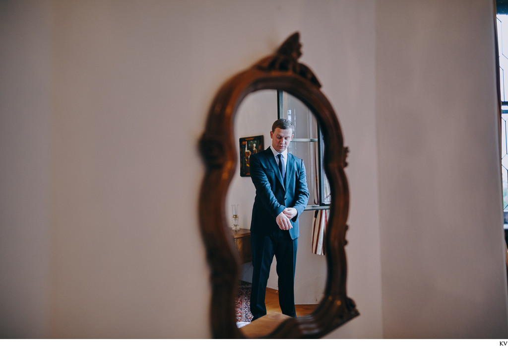 groom in mirror