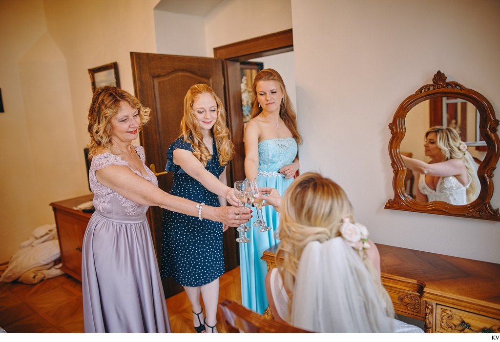 Champagne toast for the bride from mother and sisters