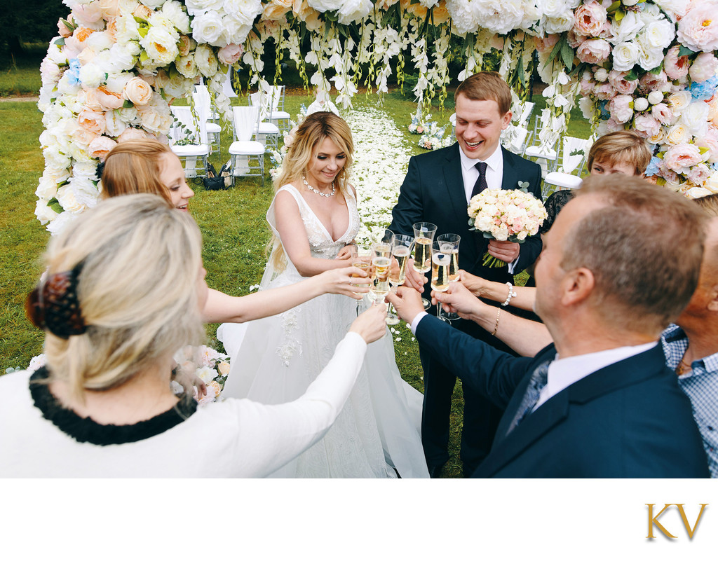 Hluboka nad Vltavou Castle wedding toasting newlyweds