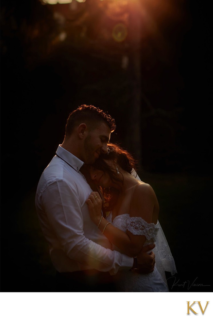 bride & groom enjoying fading sunlight secret garden 