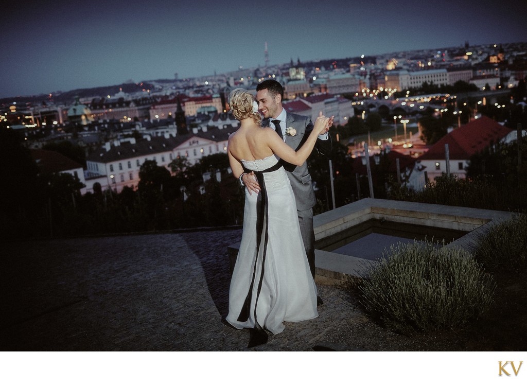 Dancing  with his bride above Prague