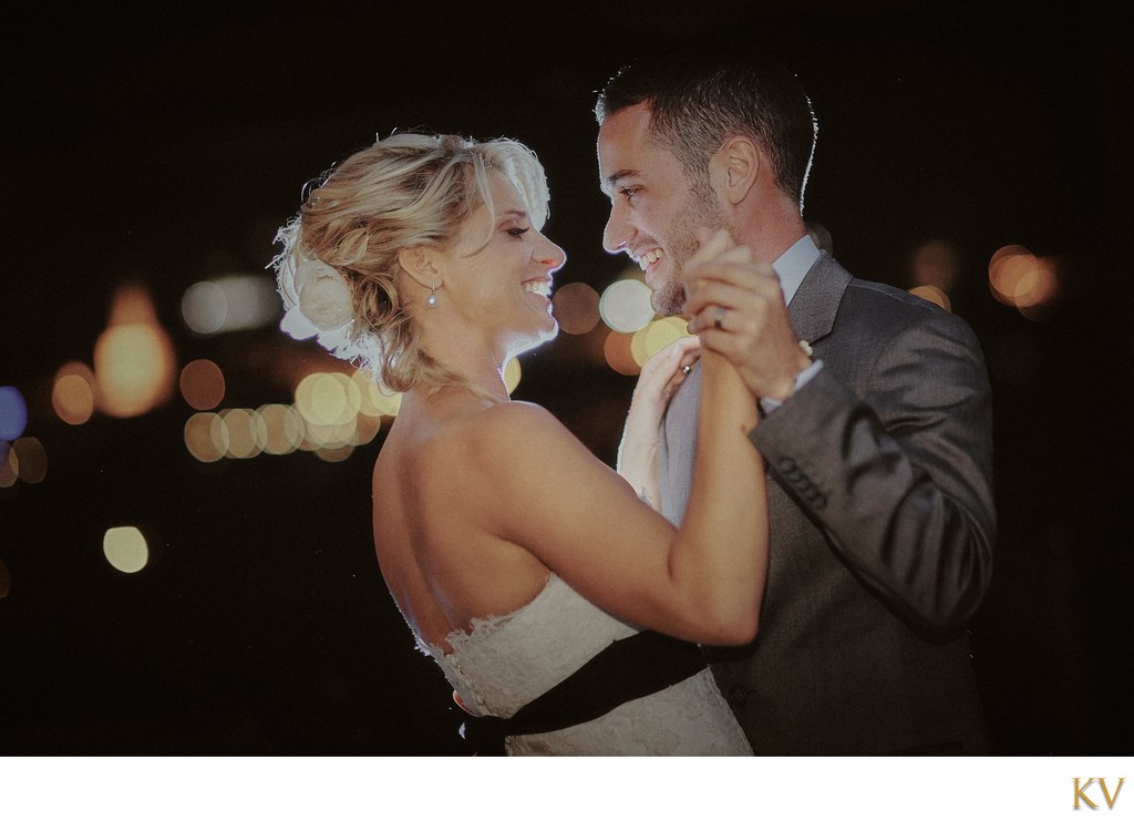 Happy newlyweds during First Dance overlooking Prague