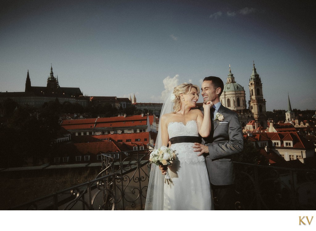 Heartfelt laugh New Zealand Newlyweds atop Vrtba