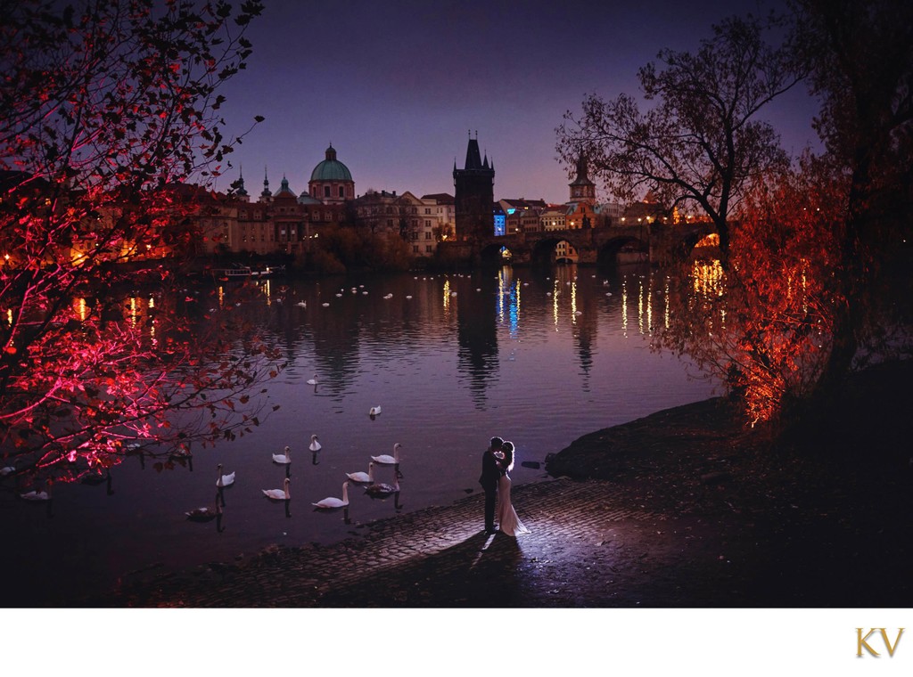 swans watch as S+O embrace Prague sunrise engagement 
