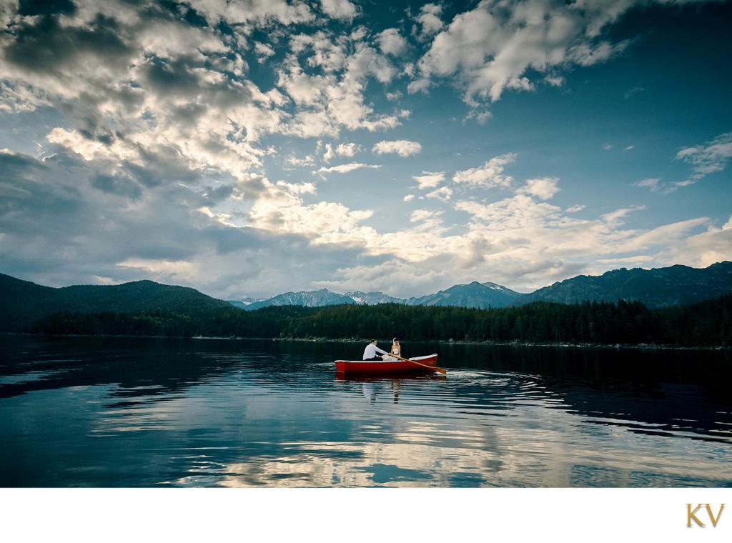 newlyweds in red rowboat Lake Eibsee