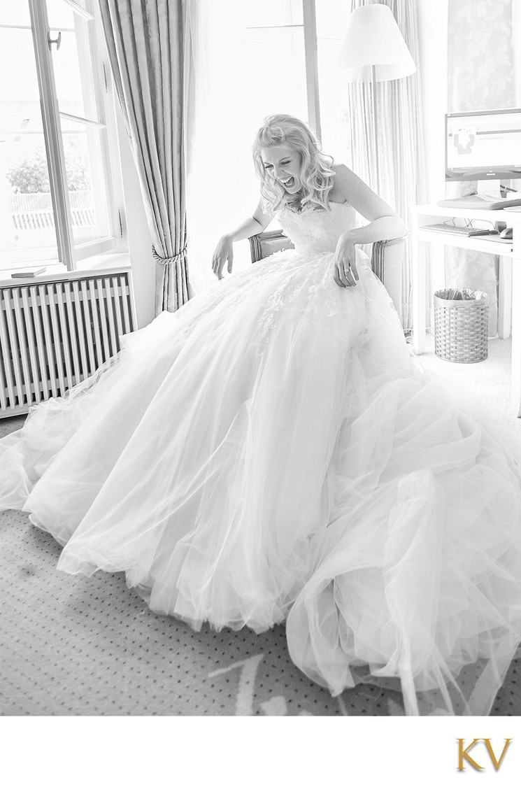 New Zealand Bride laughing after putting on her dress